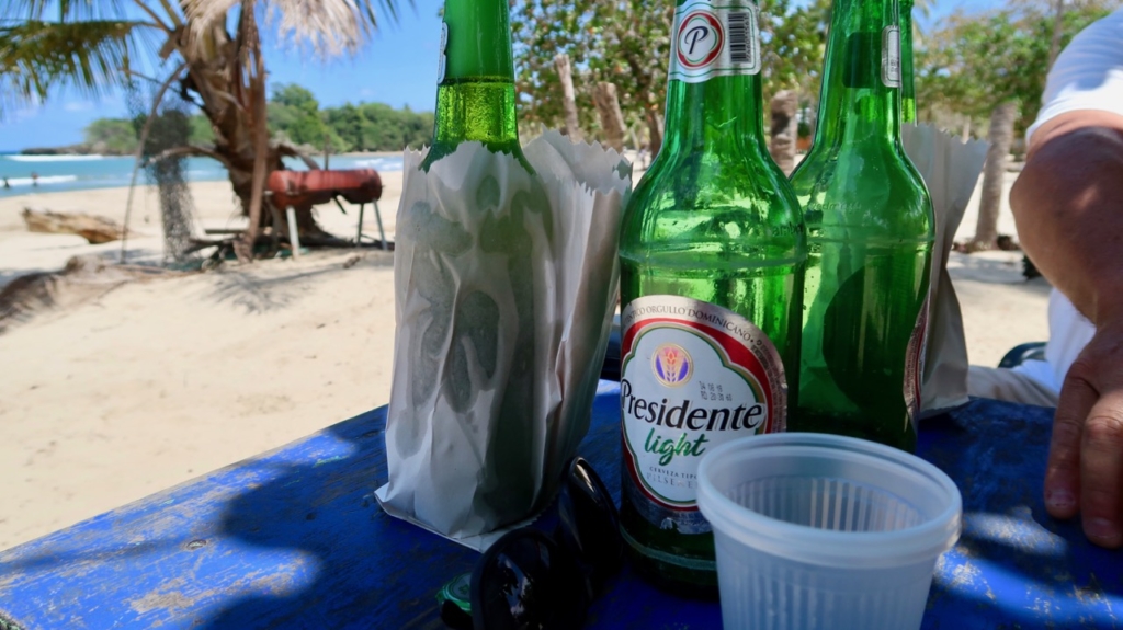 Photo of Beer Bottles on a table at the beach