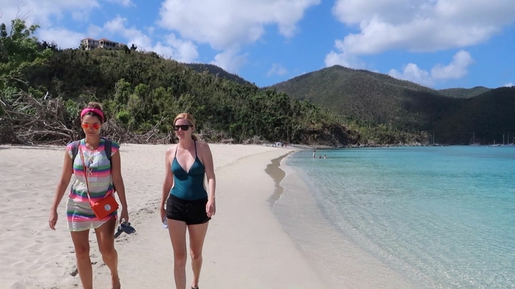 girls walking on beach in St. John USVI - Sailing Satori