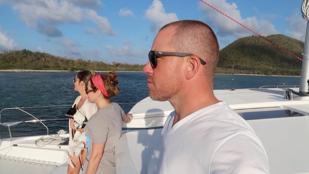 photo of Nick Kelly and Adrianne on a Catamaran in the BVI