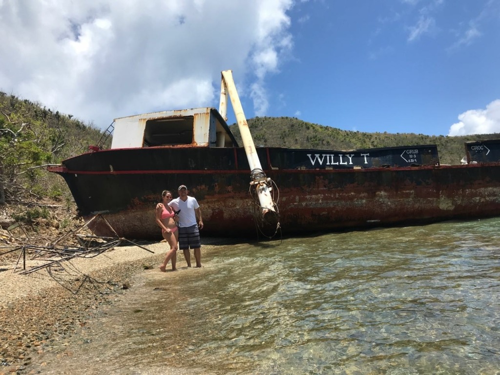 the old Willy-T floating bar washed ashore at the bight in norman island